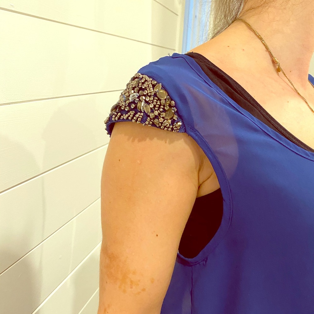 Sheer royal blue beaded cap sleeve blouse